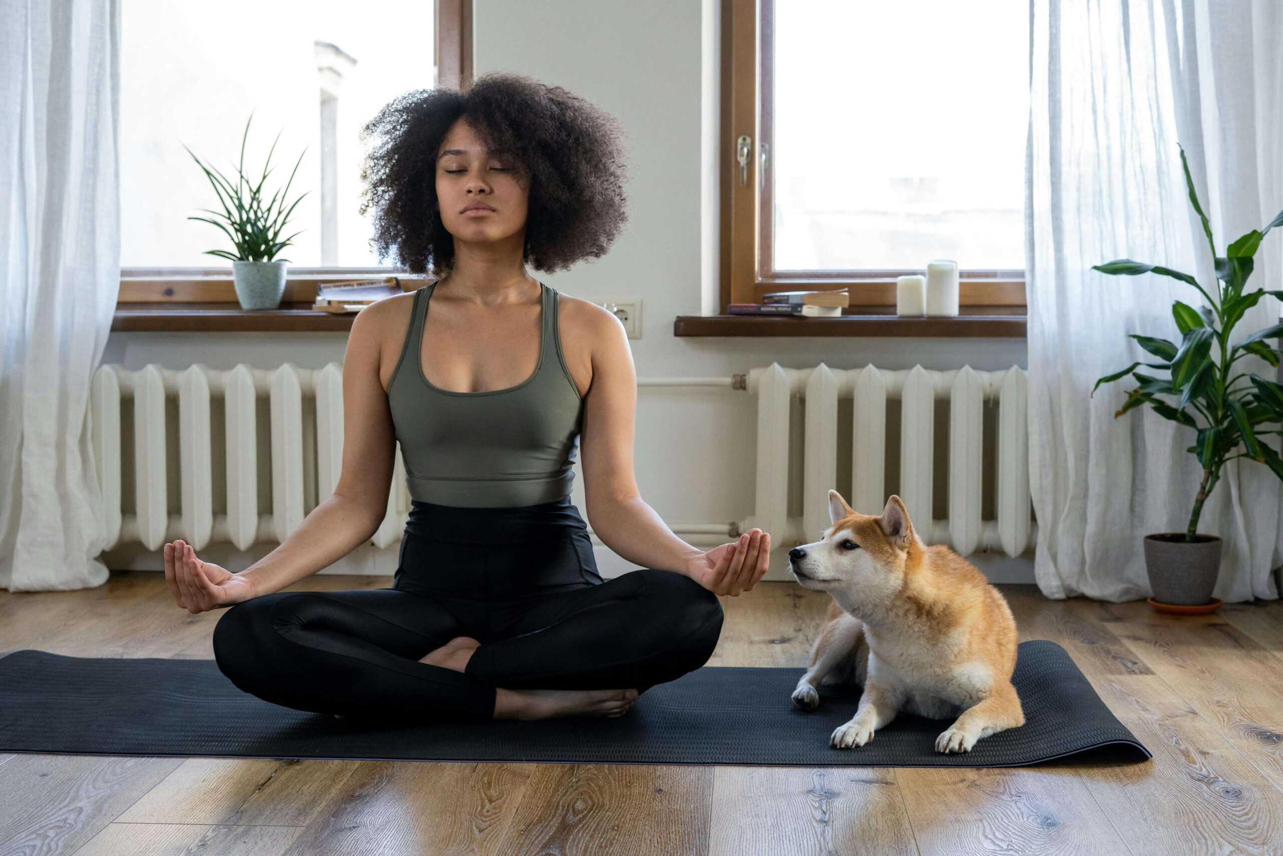 mediating-with-dog woman meditating with dog